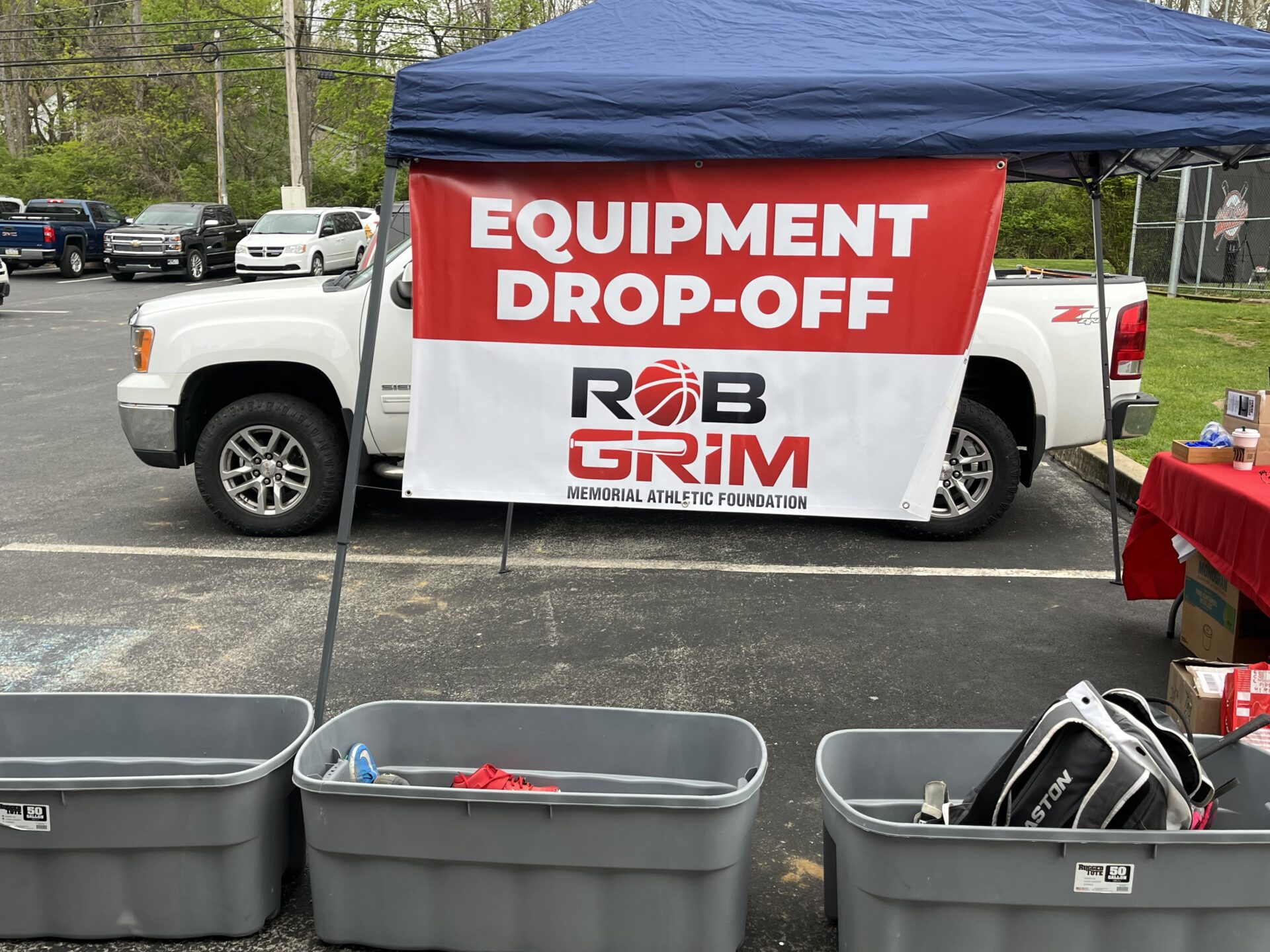 Equipment Drop Off banner at a parking lot